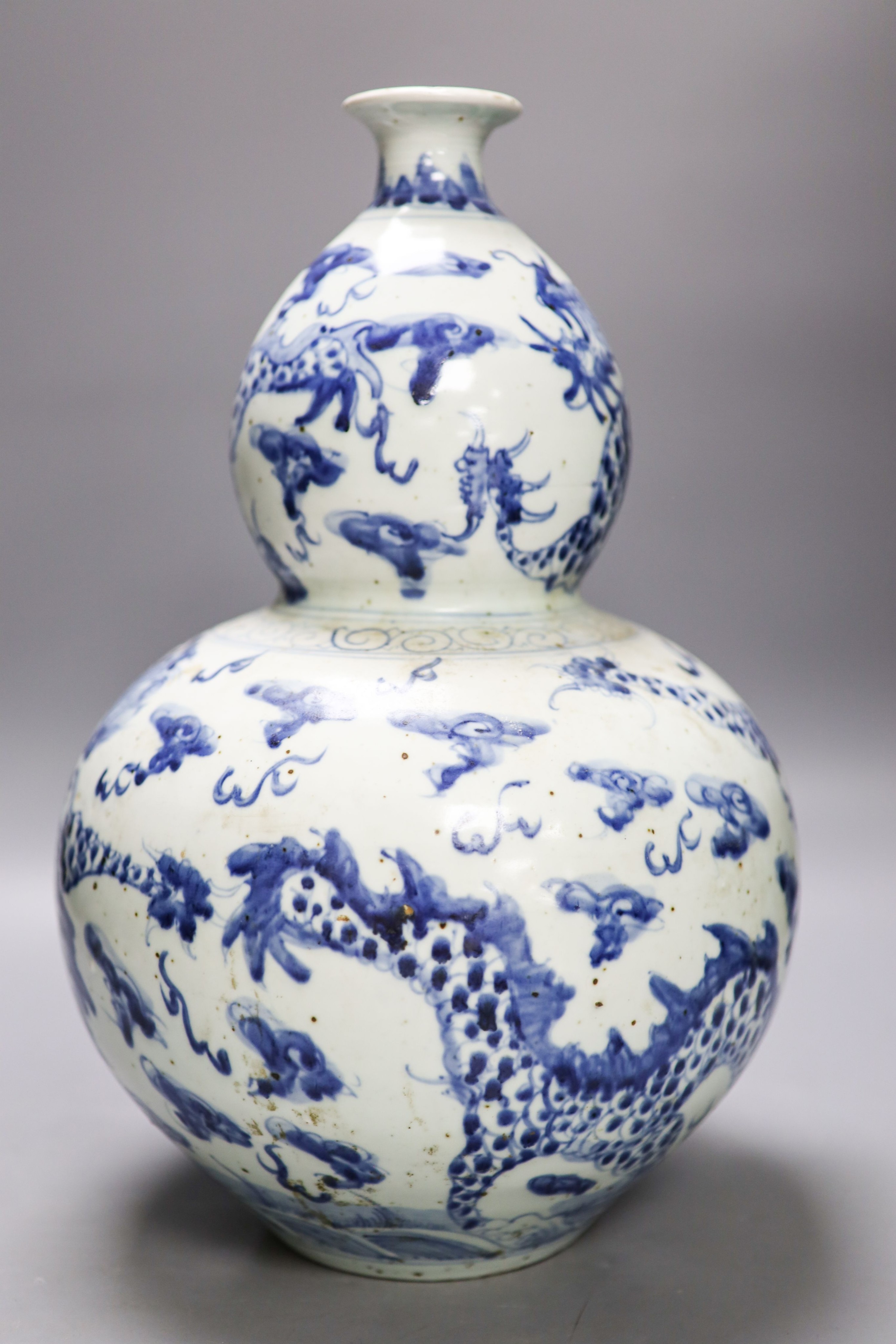 An impressive Chinese blue and white double gourd ‘dragon’ vase 37cm